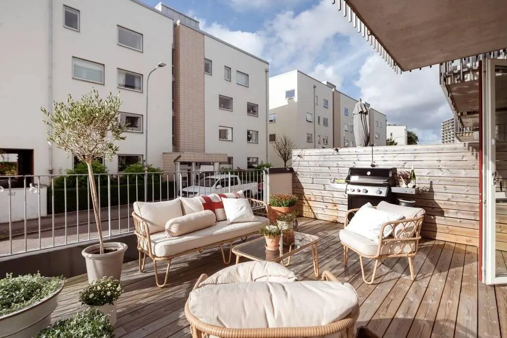 Sunlit terrace in Swedish studio apartment