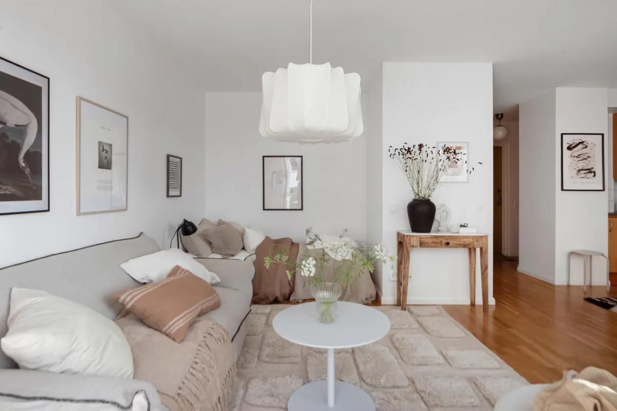 Space-saving furniture in Scandinavian studio apartment