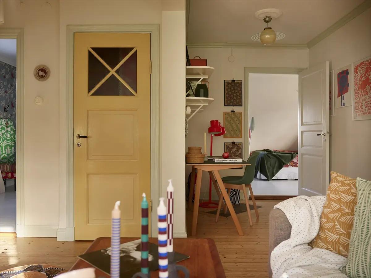 Yellow door to the toilet in the Swedish house