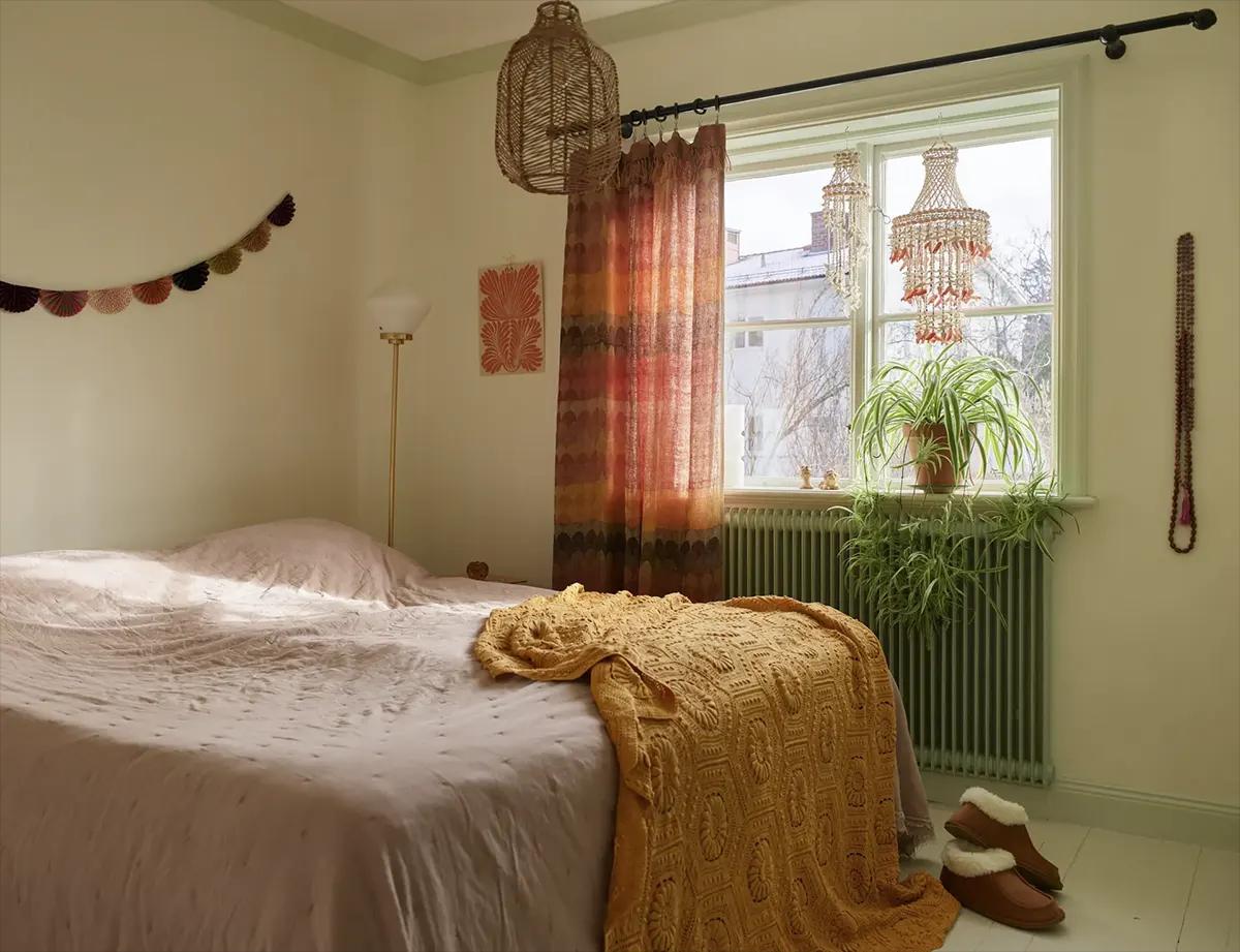 Master bedroom with decorative pendant lights