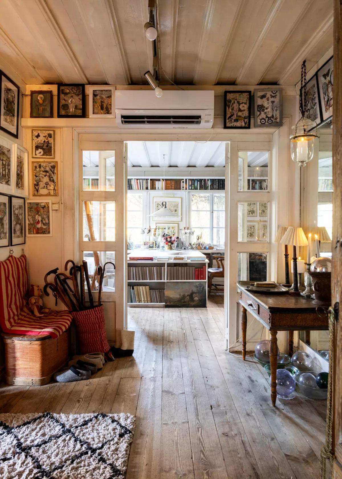 Entryway with an old painted bench