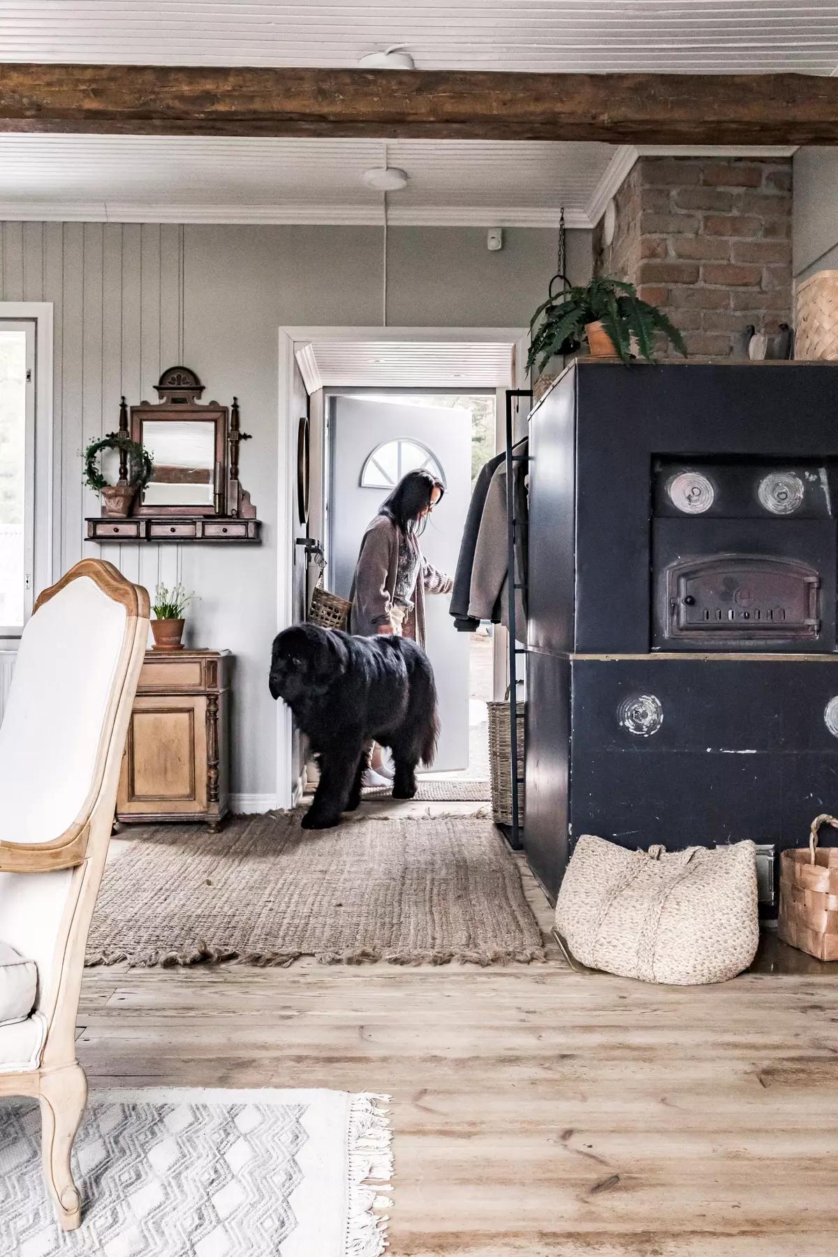 Large black wood-burning stove in the hallway