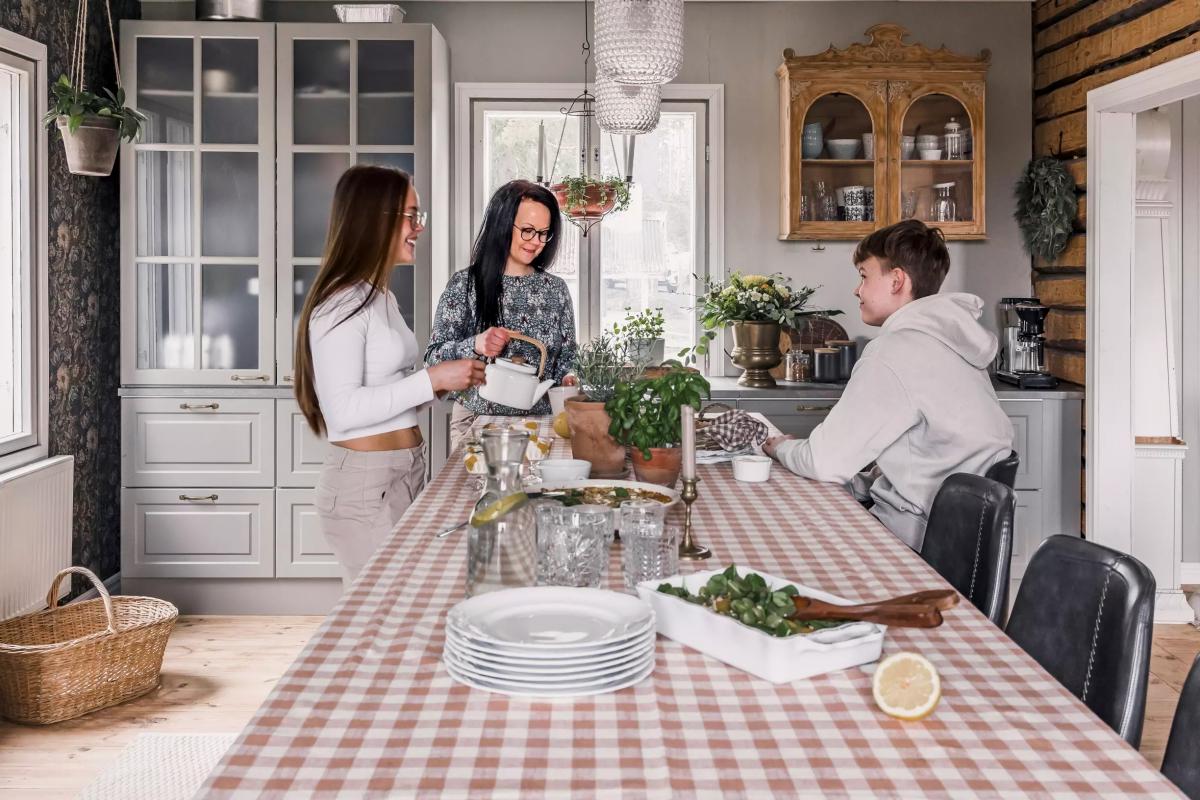 Finnish family chatting in the kitchen
