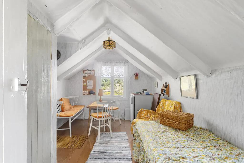 Bedroom in a 1929 island cottage with simple decor