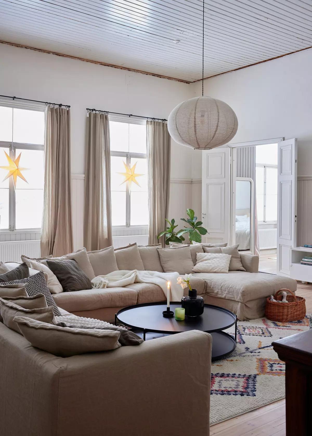 Large living room with a corner beige sofa